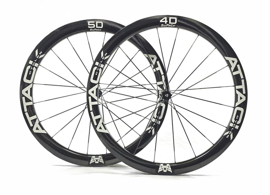 ATTACKCYCLES SuPrLt 4D/5D wheelset in white, photographed at an angle.